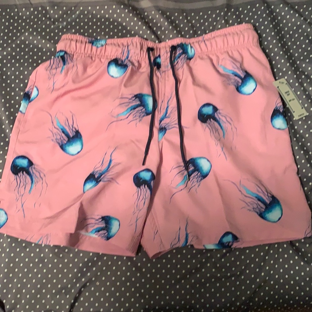 Pink jelly fish swim trunks